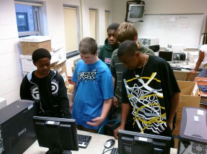 Net Literacy Student Chair David Johnson (Far Left) teaching student volunteers